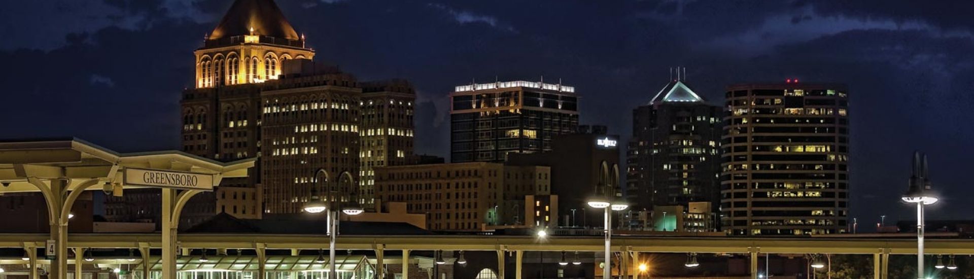 Greensboro-night-skyline-with-moon-by-dan-routh-photography 1