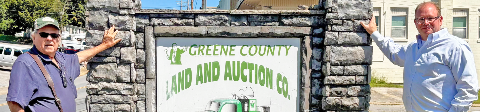 Greene county land and auction sign with larry and bart2