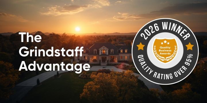 2026 Quality Business Award winner seal for Grindstaff Auctions & Realty, recognizing a 95% plus quality rating for auctioneering and real estate services in Richmond, Virginia.