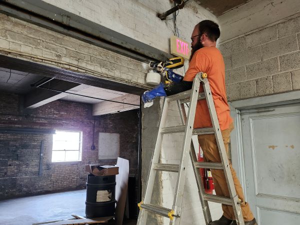 tyler_painting_on_ladder