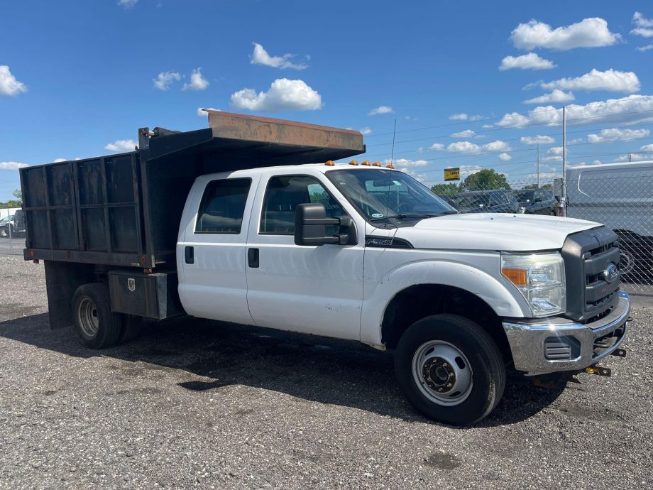 Image for 2015 Ford F350 XLT SD Crew Cab 4x4 9’ Dump Truck