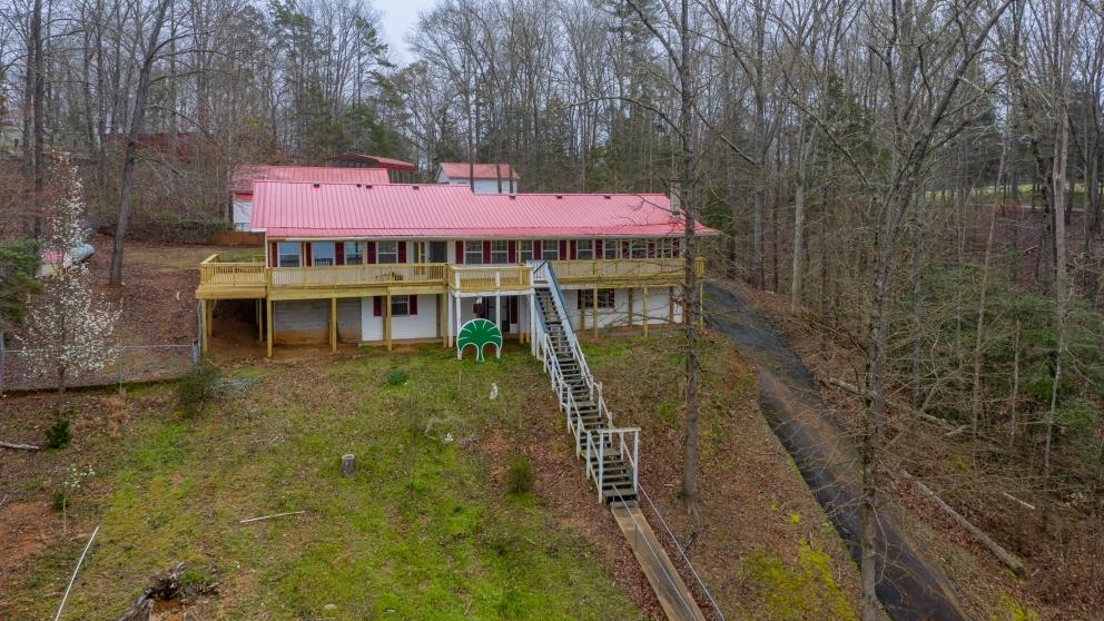 Image for ABSOLUTE AUCTION:  Docked Lake Secession Home with Outbuildings and Private Boat Ramp