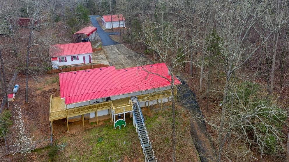 Image for ABSOLUTE AUCTION:  Docked Lake Secession Home with Outbuildings and Private Boat Ramp