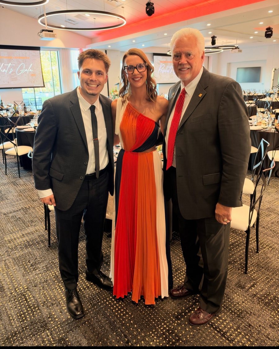Travis Buman, Courtney Buman and Jay Nitz, the Jack Nitz benefit auction team, at a Doane University gala