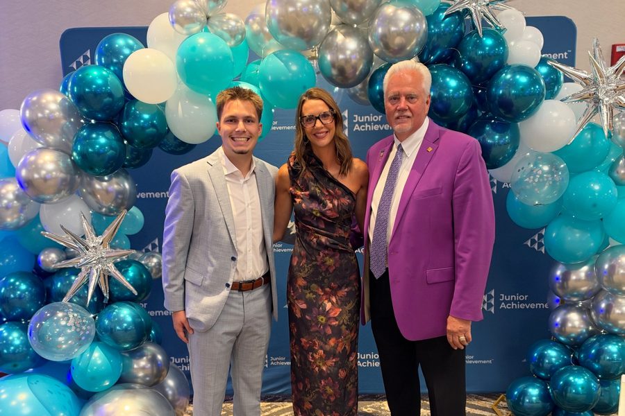 Travis Buman, Courtney Buman and Jay Nitz at a Junior Achievement fundraising event