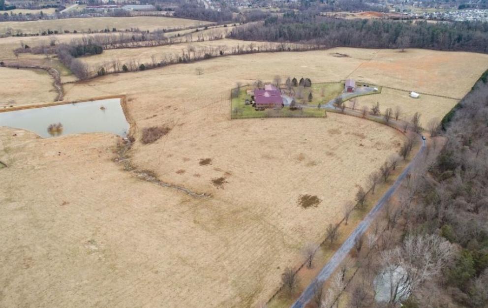 Image for 3 BR/2.5 BA Custom Log Home on 72 +/- Acres w/3 Bay Outbuilding, Pond, Fencing & Kennels