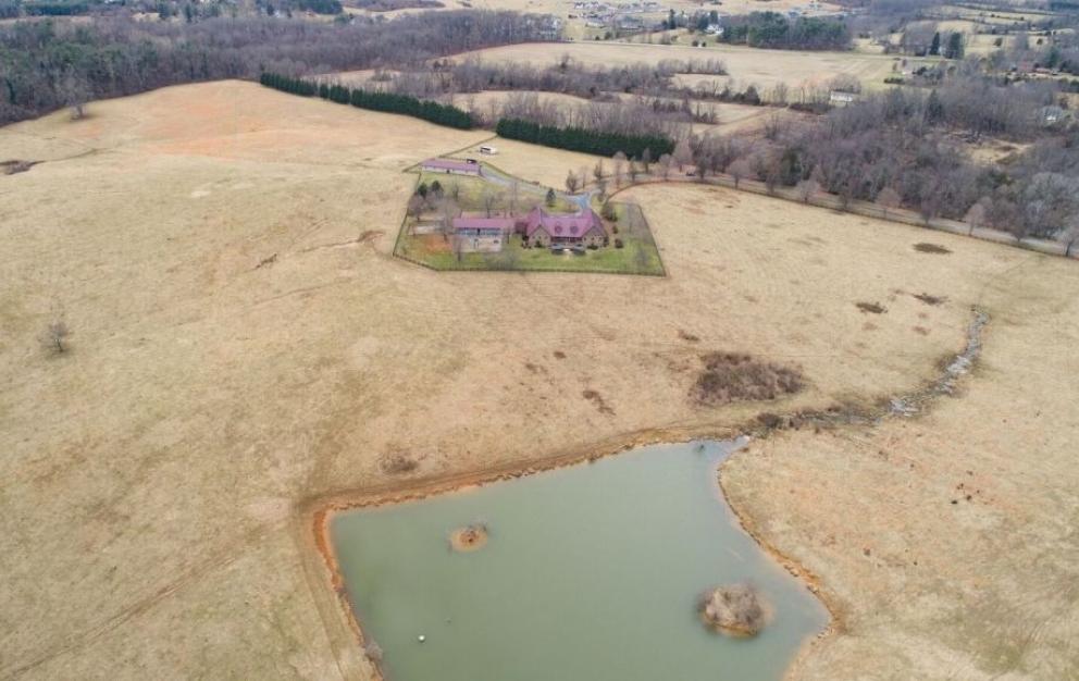 Image for 3 BR/2.5 BA Custom Log Home on 72 +/- Acres w/3 Bay Outbuilding, Pond, Fencing & Kennels