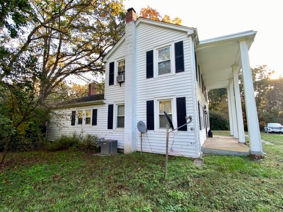 Image for 55.16 +/- Acres of Desirable Land Fronting Smith Station Rd. w/3 BR Home & Outbuildings