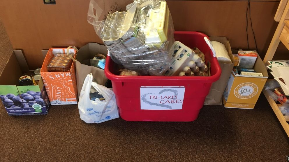 150 pounds of donations to Tri-Lakes Cares
