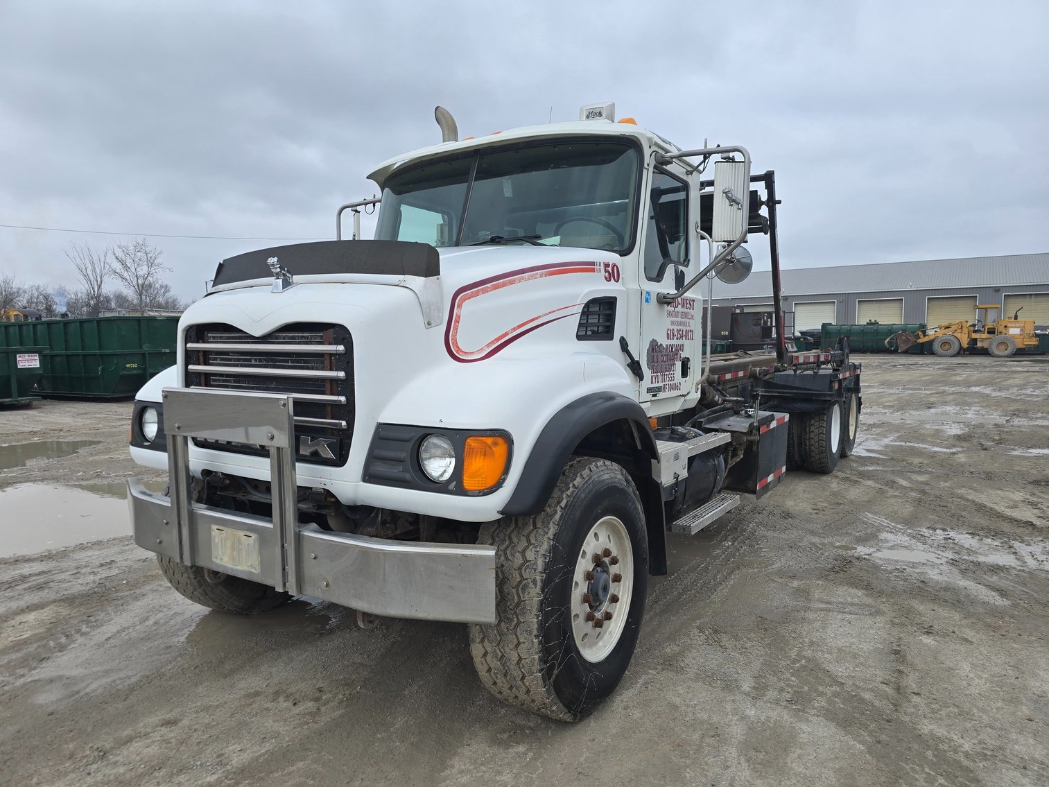 2007 Mack CV713 Granite Roll-Off Truck at Sexton Auctioneers auction