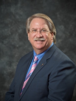 Photo of David E. Gilmore, CCIM, CAI, AARE